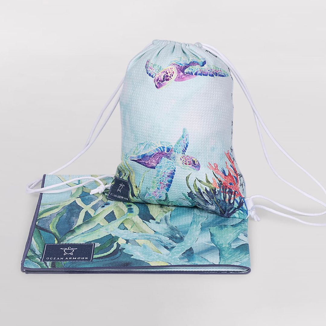 Ocean Armour quick-dry Sea Turtle beach towel and coordinating drawstring storage bag for beach and travel.